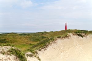 Red lighthouse in the dunes
